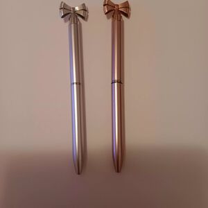 🩷Writing Pens, Black Ink, Bow Tie Silver And Gold 1 Each Used